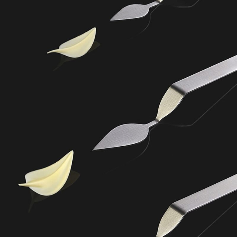 CUILLERE INOX DECORE FEUILLE "S" 42X22MM