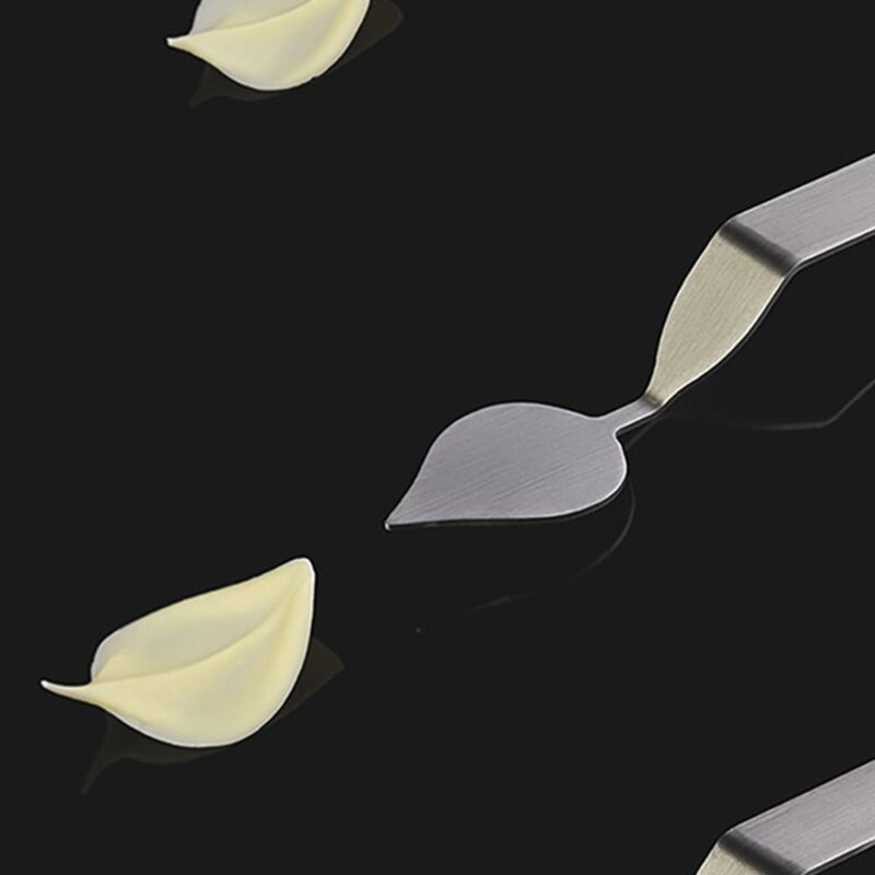 STAINLESS STEEL SPOON DECORATED WIDE LEAF "M" 50X36MM